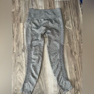 Fabletics 7/8 length Leggings with Laser Cut Side Designa in Gray Size Small